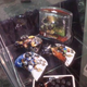 Illustration for article titled Mad Catz Street Fighter IV Sticks Under Glass